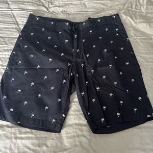 Navy Blue 9 inch shorts with white palm trees